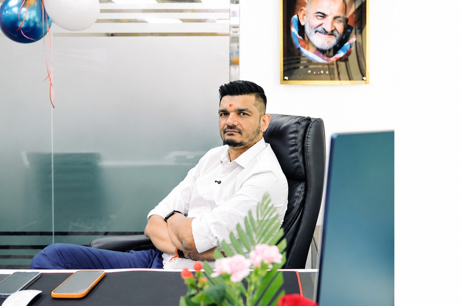 Priteesh Patel seated in his office
