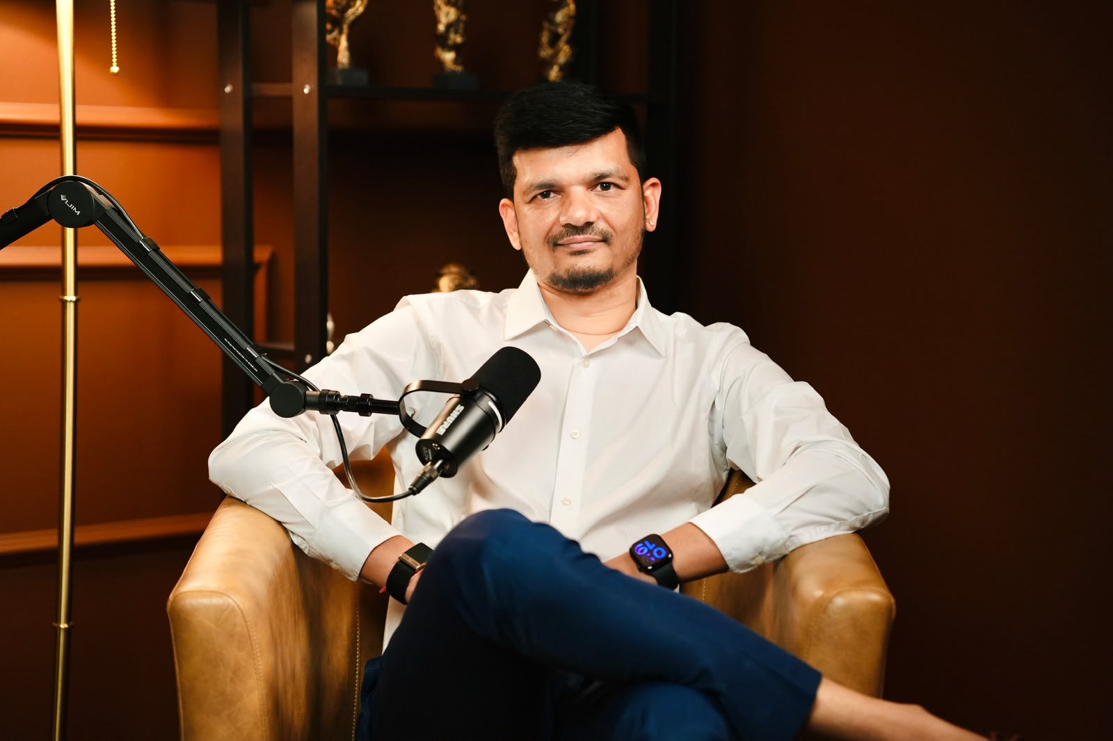 Priteesh Patel speaking on a podcast